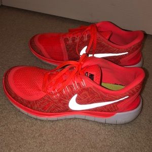 nike bright orange running shoes